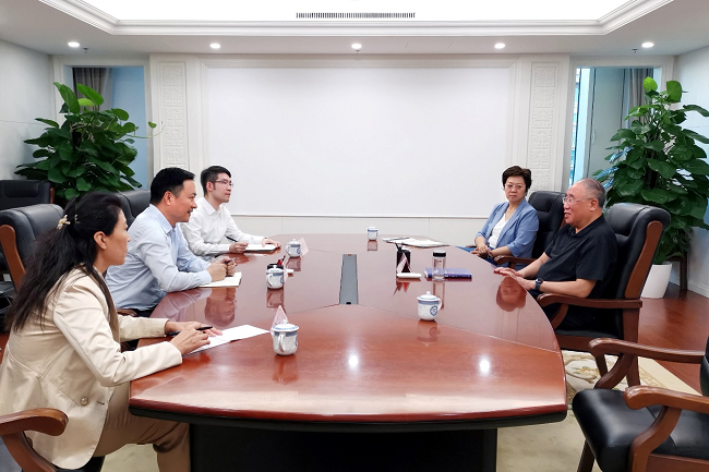 余红辉拜访中国气候变化事务特使解振华